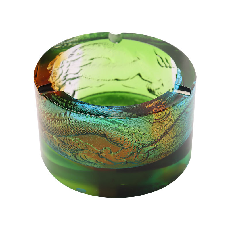 Glass ashtray with dragon-out-of-sea pattern