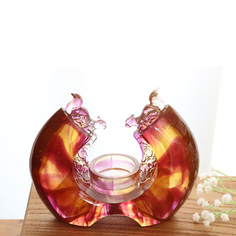 Purple colored glaze candlestick
