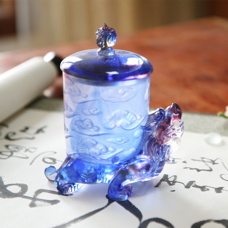 Blue glass crystal cup with lid, mythical beast base