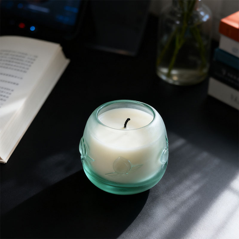 Peach-shaped longevity motif candle cup