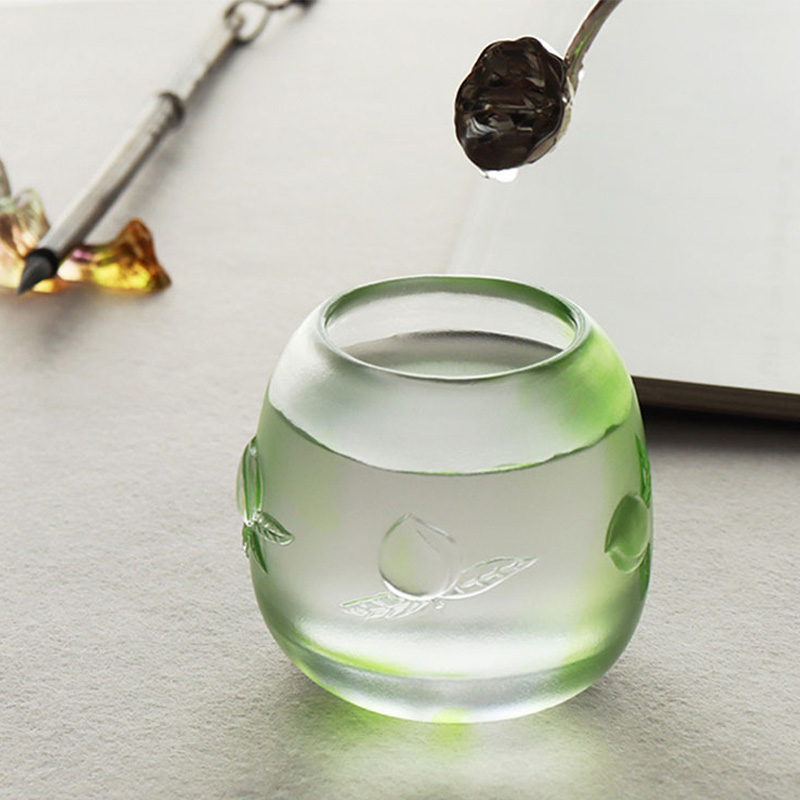 Peach-shaped longevity motif candle cup