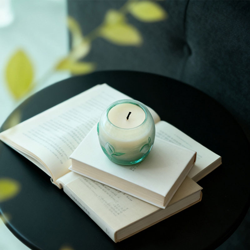 Peach-shaped longevity motif candle cup