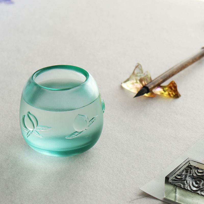 Peach-shaped longevity motif candle cup
