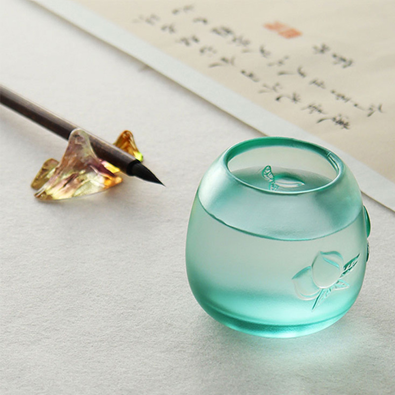 Peach-shaped longevity motif candle cup