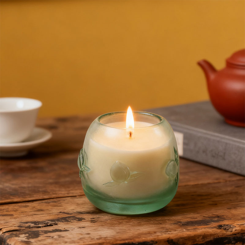 Peach-shaped longevity motif candle cup